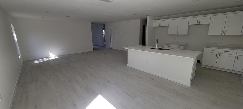 3082 Parade Terrace North Port, FL 34286 - Photo 3 of 18 a room with a washing machine