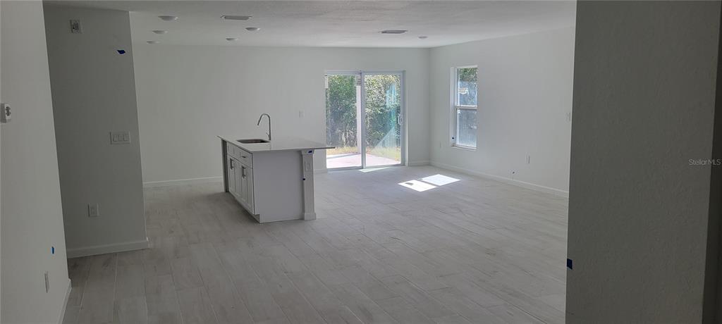 3082 Parade Terrace North Port, FL 34286 - Photo 4 of 18 an empty room with windows