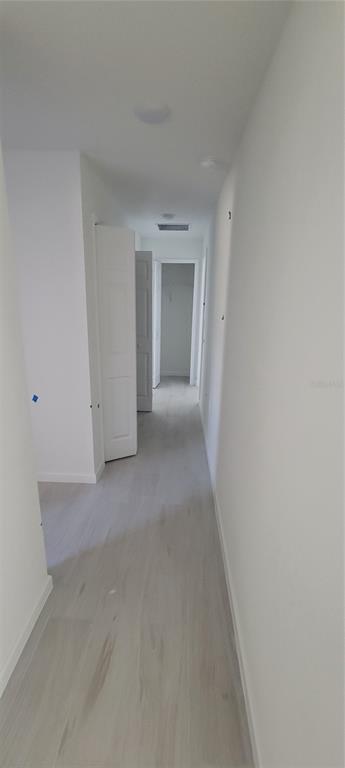 3082 Parade Terrace North Port, FL 34286 - Photo 8 of 18 a view of a room with a hallway