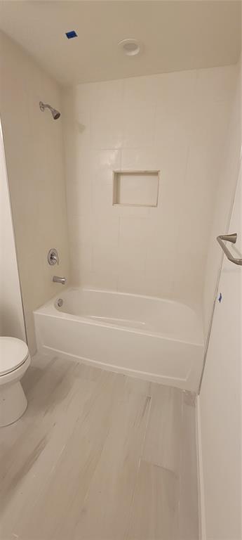 3082 Parade Terrace North Port, FL 34286 - Photo 9 of 18 a bathroom with a toilet and a bath tub