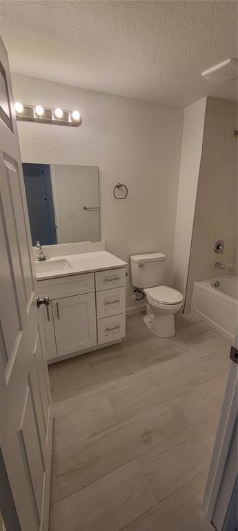 3082 Parade Terrace North Port, FL 34286 - Photo 10 of 18 a bathroom with a sink a toilet and vanity