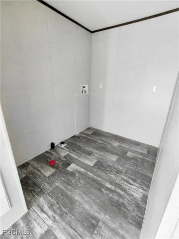 a view of a room with rack on the wall