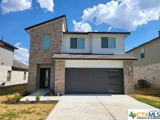 212 Coda Crossing Georgetown, TX 78633 - Photo 1 of 1 a front view of a house with a yard