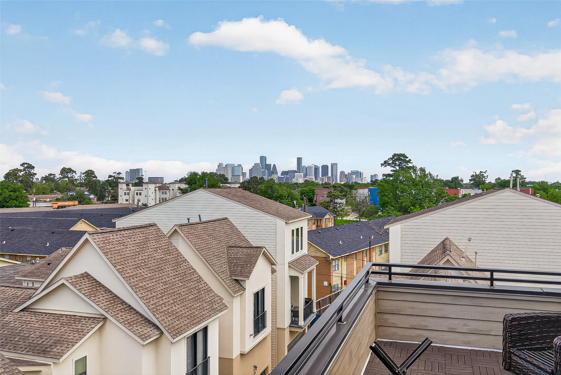 2611 Riverside Drive, Unit C Houston, TX 77004 - Photo 9 of 50 This rooftop view highlighting city skyline. The sky is clear, offering a bright and open atmosphere.