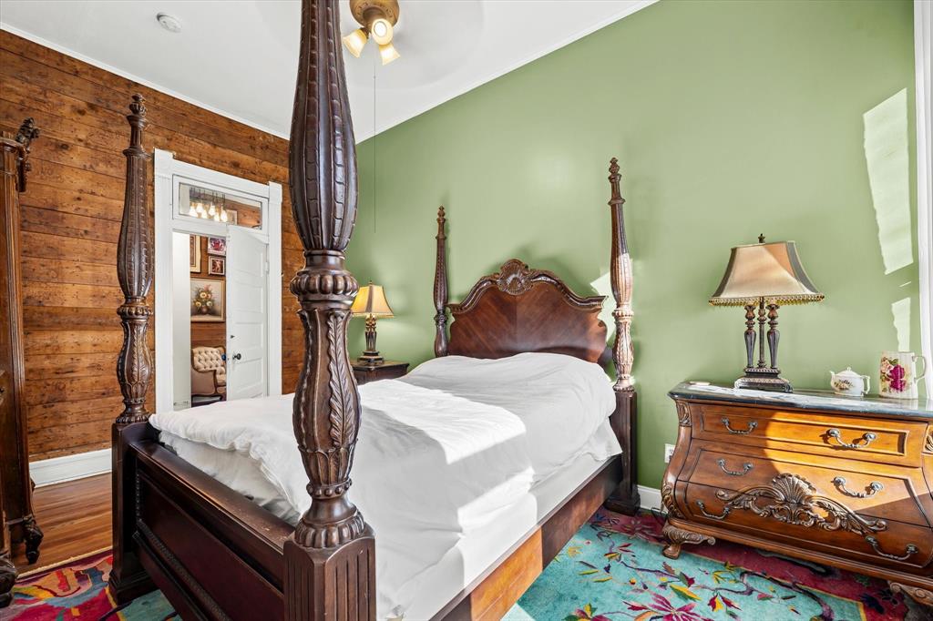 1618 North 6th Street Waco, TX 76707 - Photo 18 of 36 a bedroom with bed and window