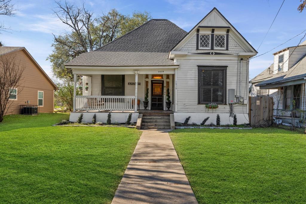 1618 North 6th Street Waco, TX 76707 - Photo 2 of 36 a front view of a house with a garden
