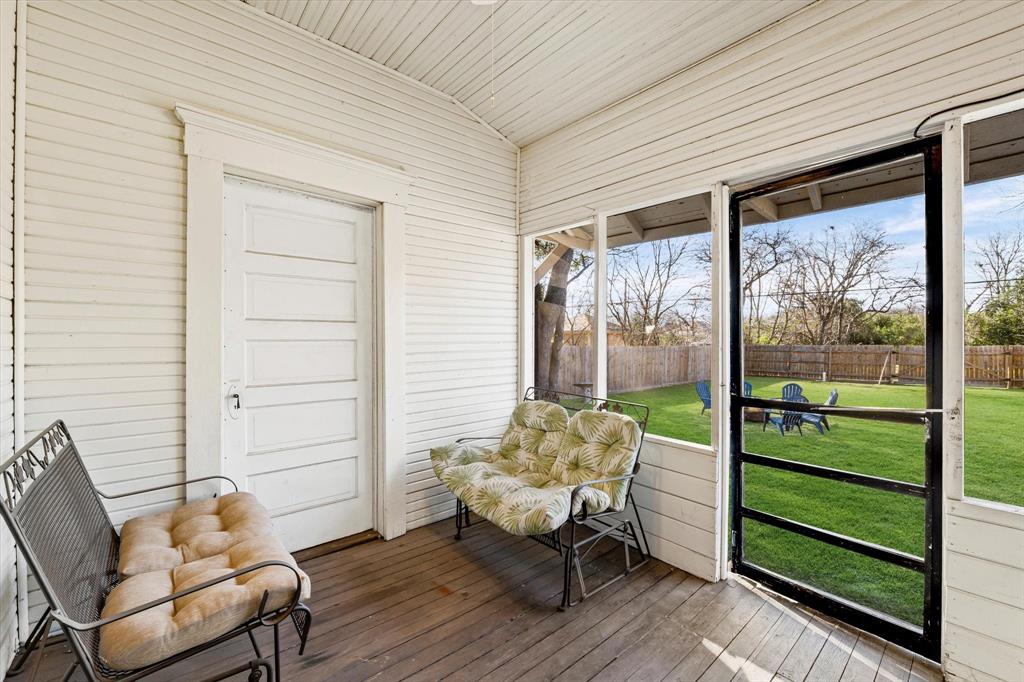 1618 North 6th Street Waco, TX 76707 - Photo 23 of 36 a balcony with couple of chairs and a wooden floor