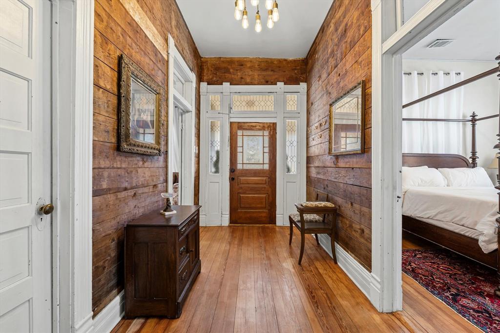 1618 North 6th Street Waco, TX 76707 - Photo 5 of 36 a bedroom with a bed and a view of walk in closet