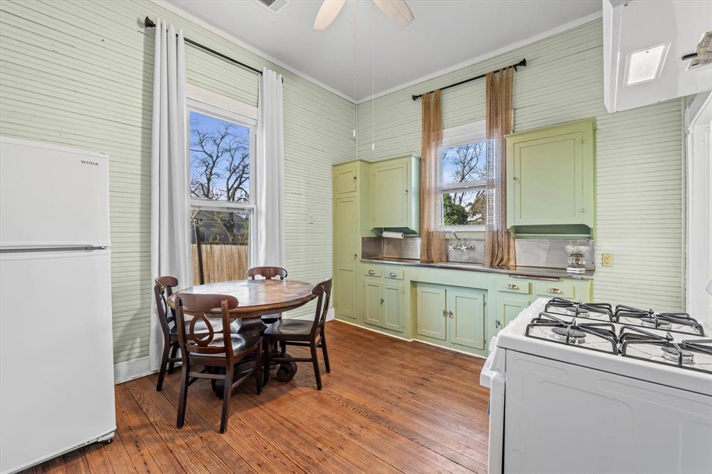 1618 North 6th Street Waco, TX 76707 - Photo 9 of 36 a view of a dining room with furniture and window