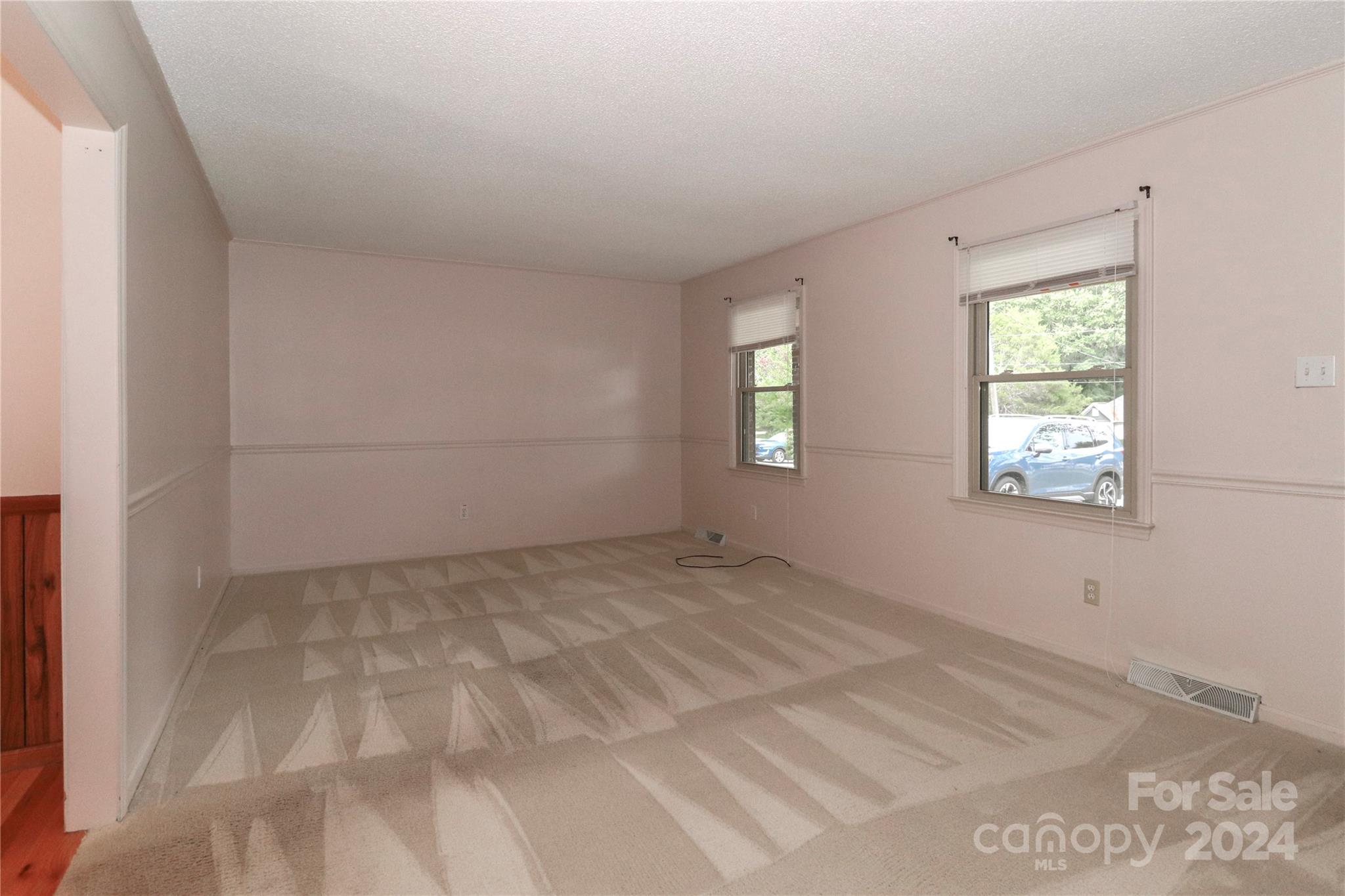168 Mooreland Road Mooresville, NC 28117 - Photo 4 of 31 a view of an empty room with a window