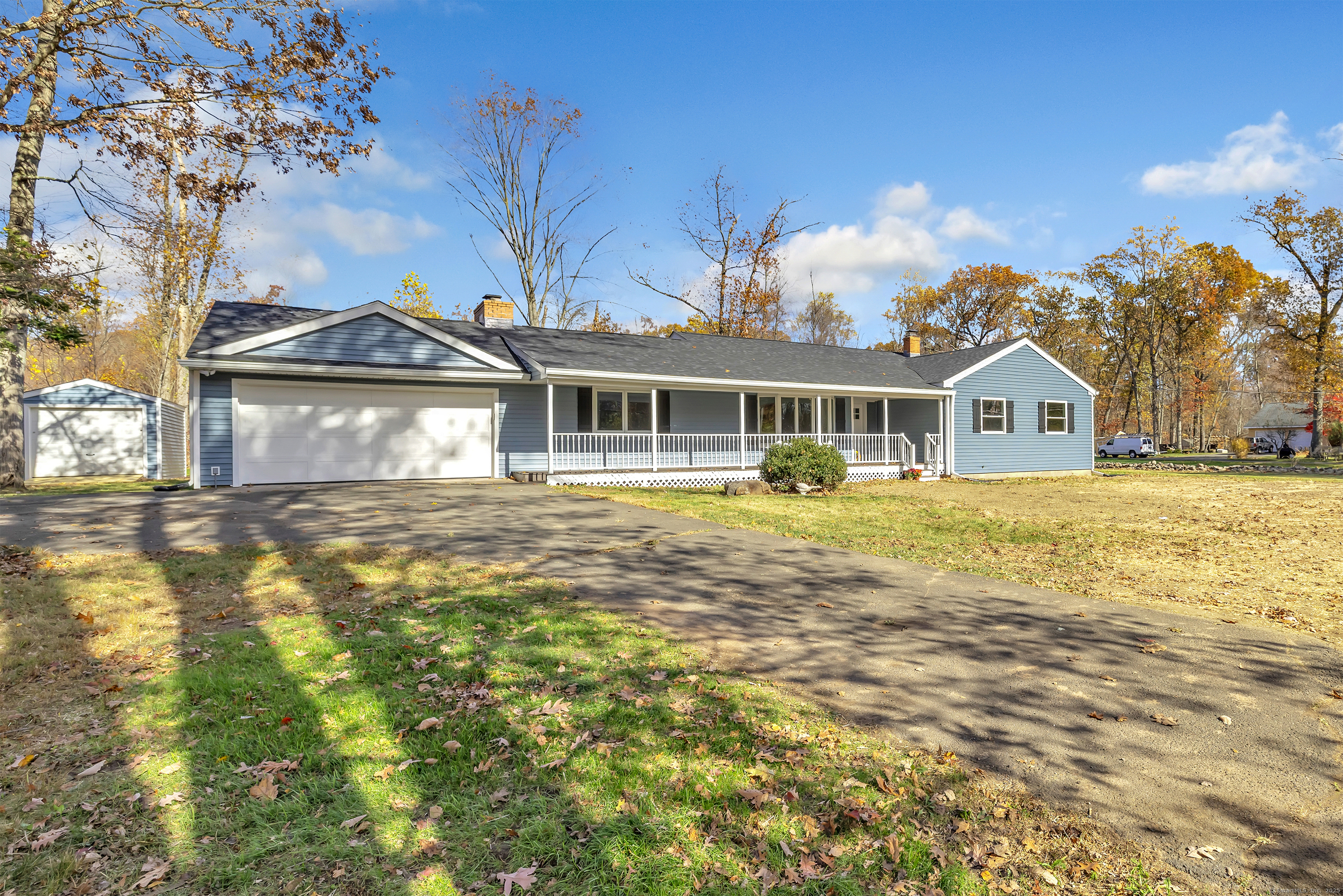 Featuring a long driveway, 2 car attached garage, and a large, level lot!