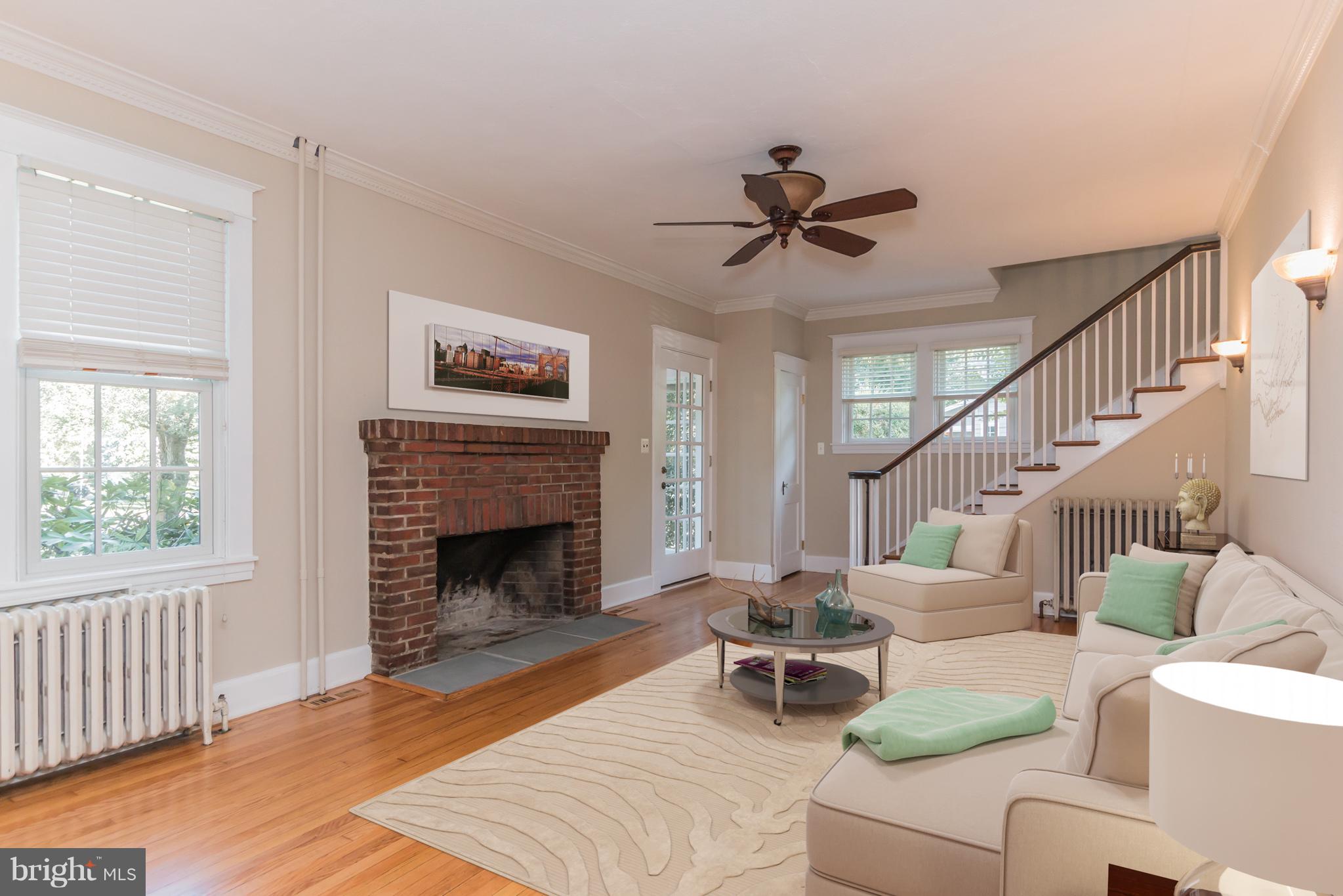 61 Church Road Arnold, MD 21012 - Photo 6 of 28 Living room, with brick wood burning fire place