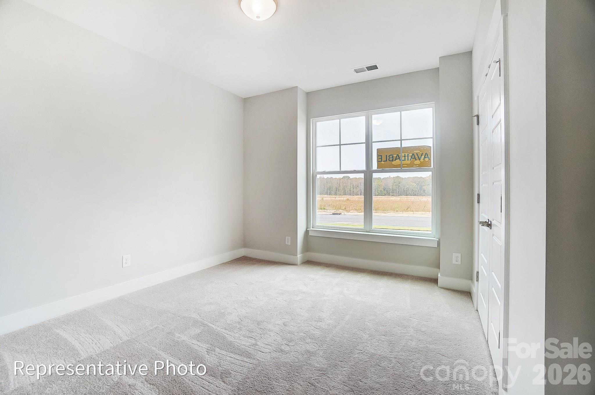 2019 Mantle Rdg Drive Indian Trail, NC 28079 - Photo 17 of 41 a view of an empty room with a window