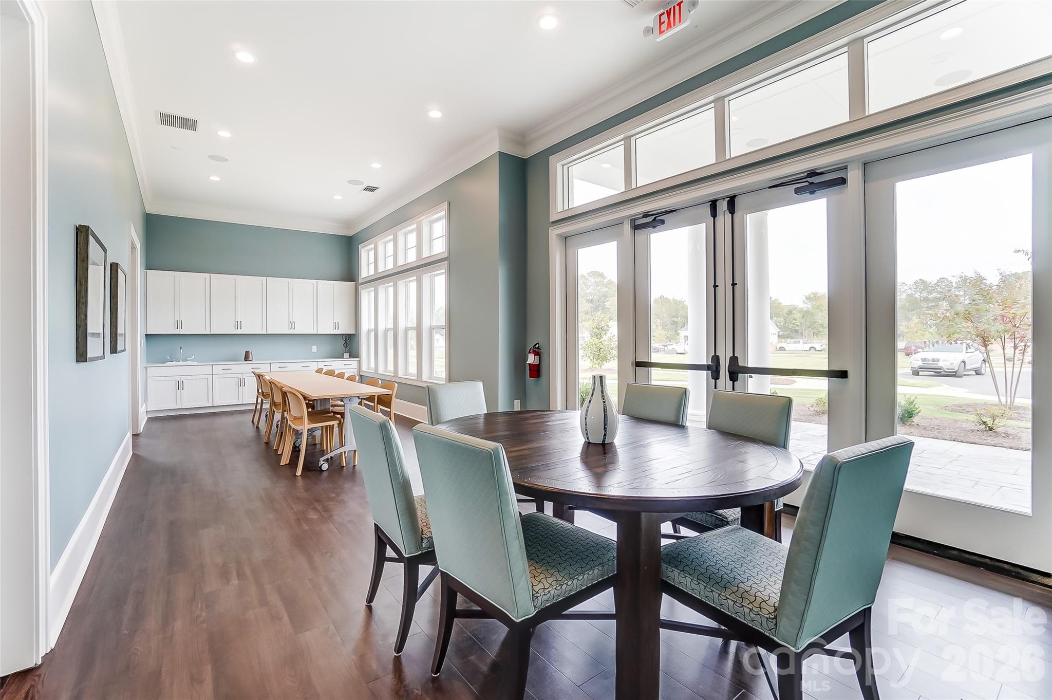 2019 Mantle Rdg Drive Indian Trail, NC 28079 - Photo 26 of 41 a view of a dining room with furniture window and wooden floor