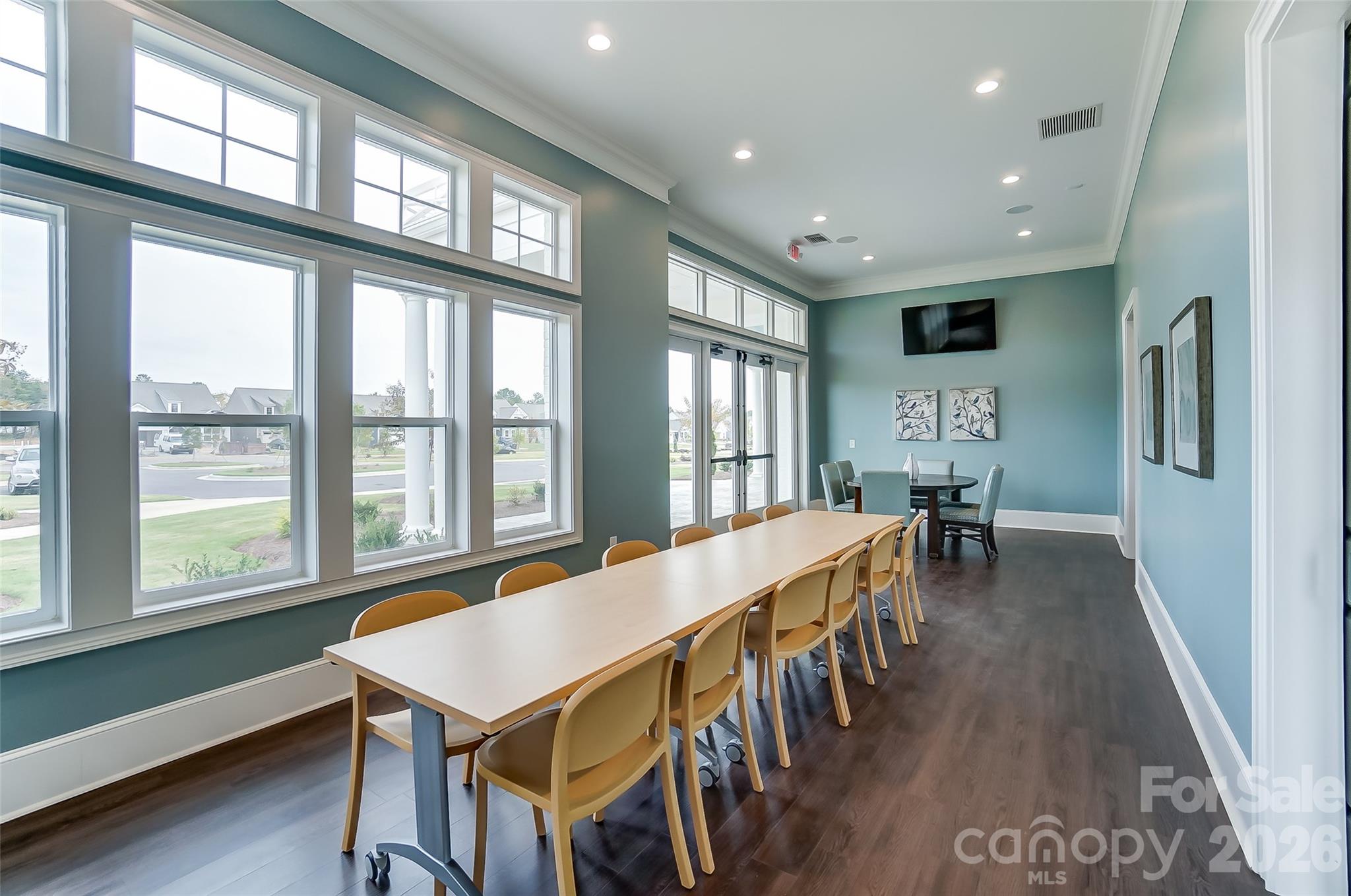 2019 Mantle Rdg Drive Indian Trail, NC 28079 - Photo 27 of 41 a dining room with furniture a chandelier and wooden floor