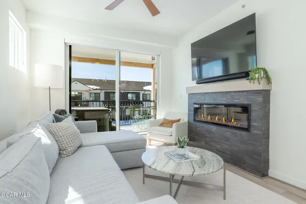 a living room with furniture and a window