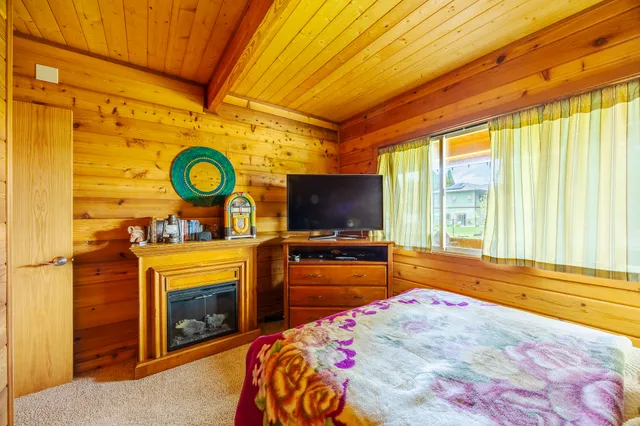 a view of entryway with a wooden door