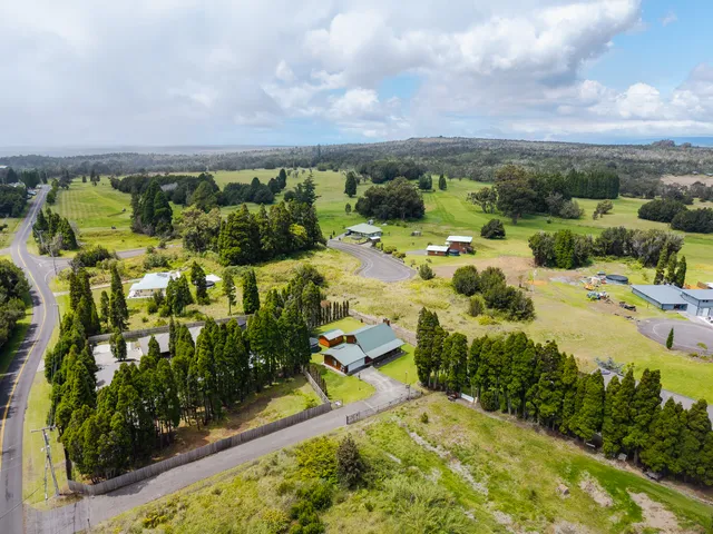 a view of yard with swimming pool
