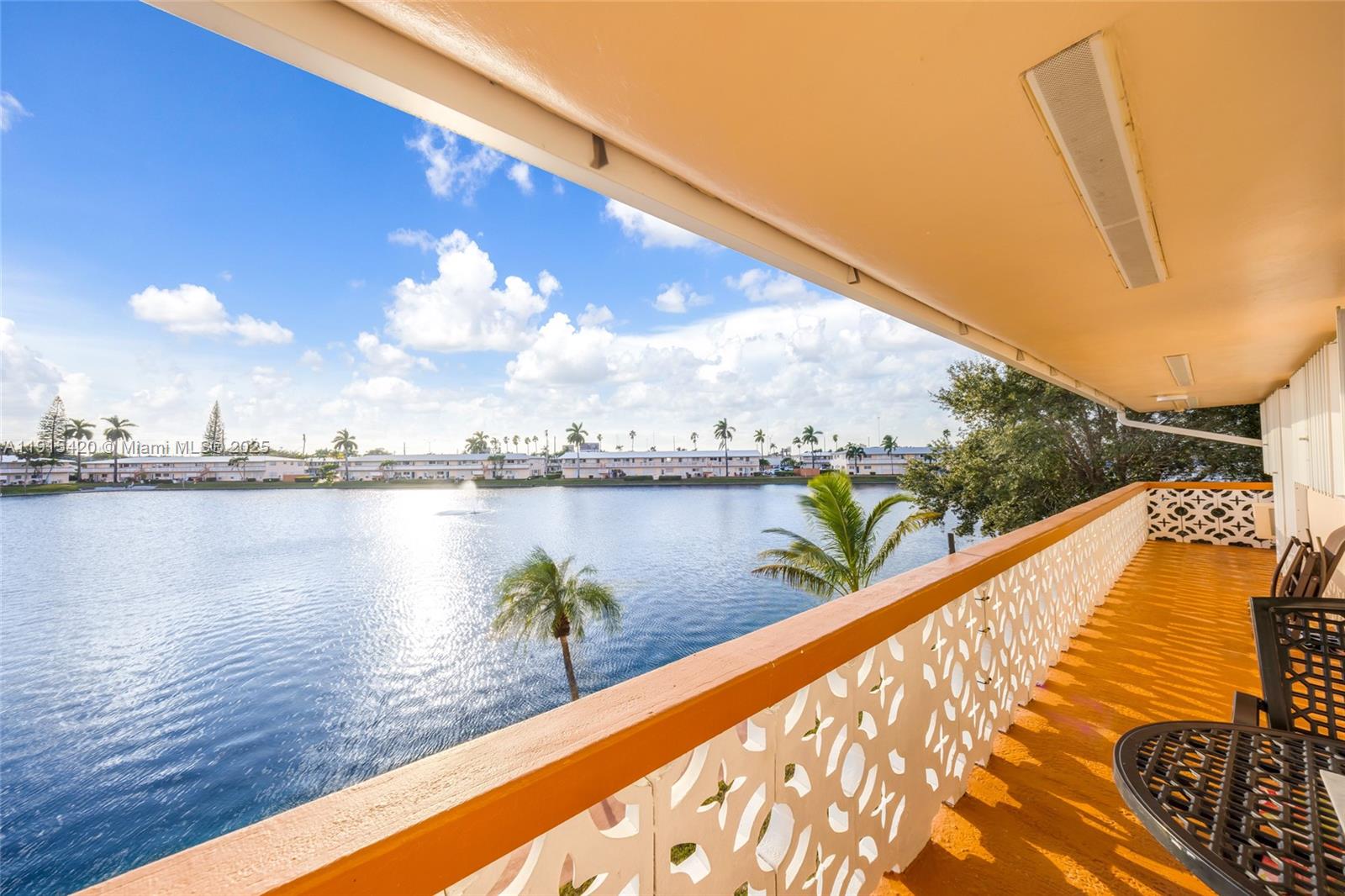 900 Southwest 10th Terrace, Unit 14S Hallandale Beach, FL 33009 - Photo 17 of 31 a view of swimming pool with a lake