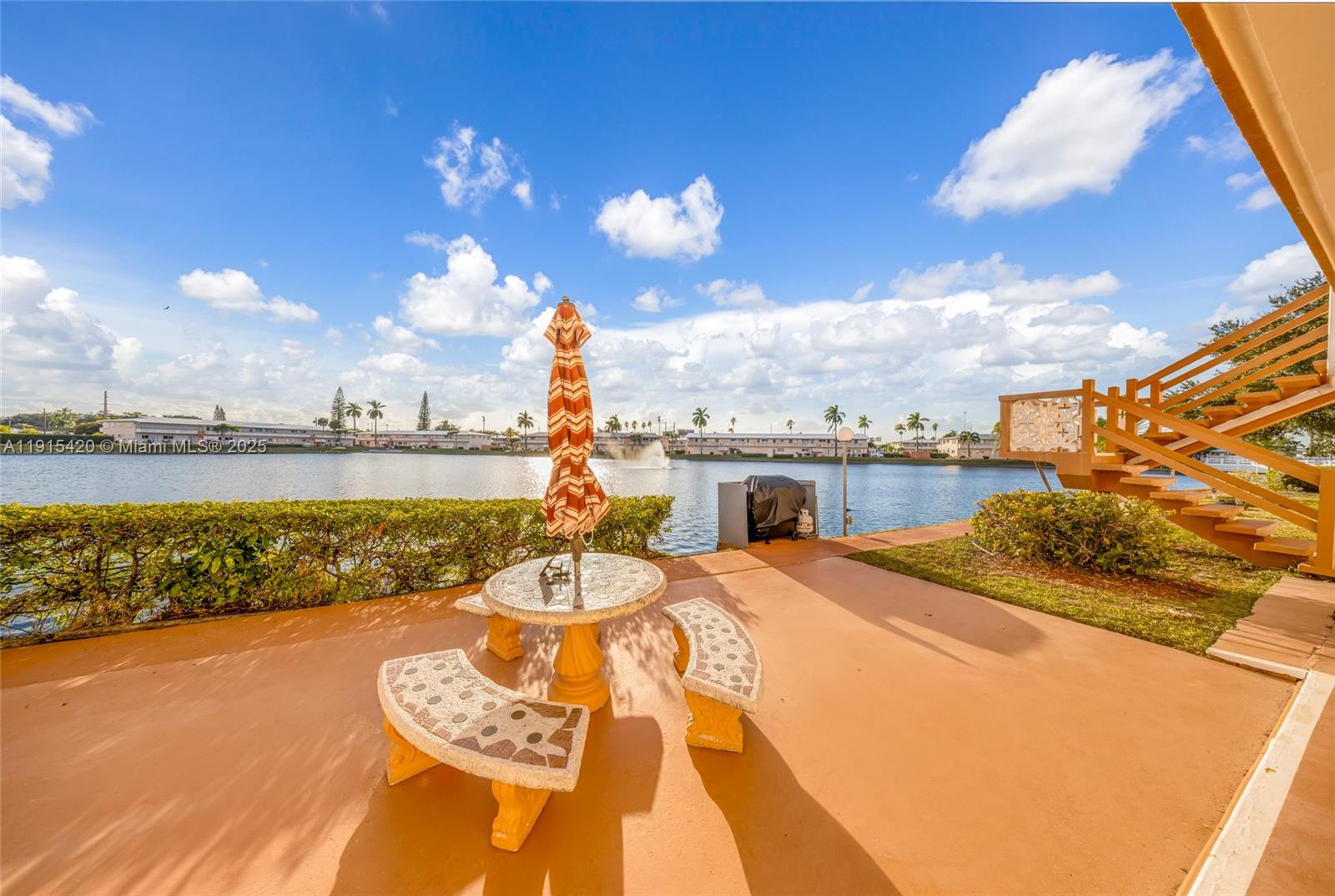 900 Southwest 10th Terrace, Unit 14S Hallandale Beach, FL 33009 - Photo 18 of 31 a view of a swimming pool with an ocean view