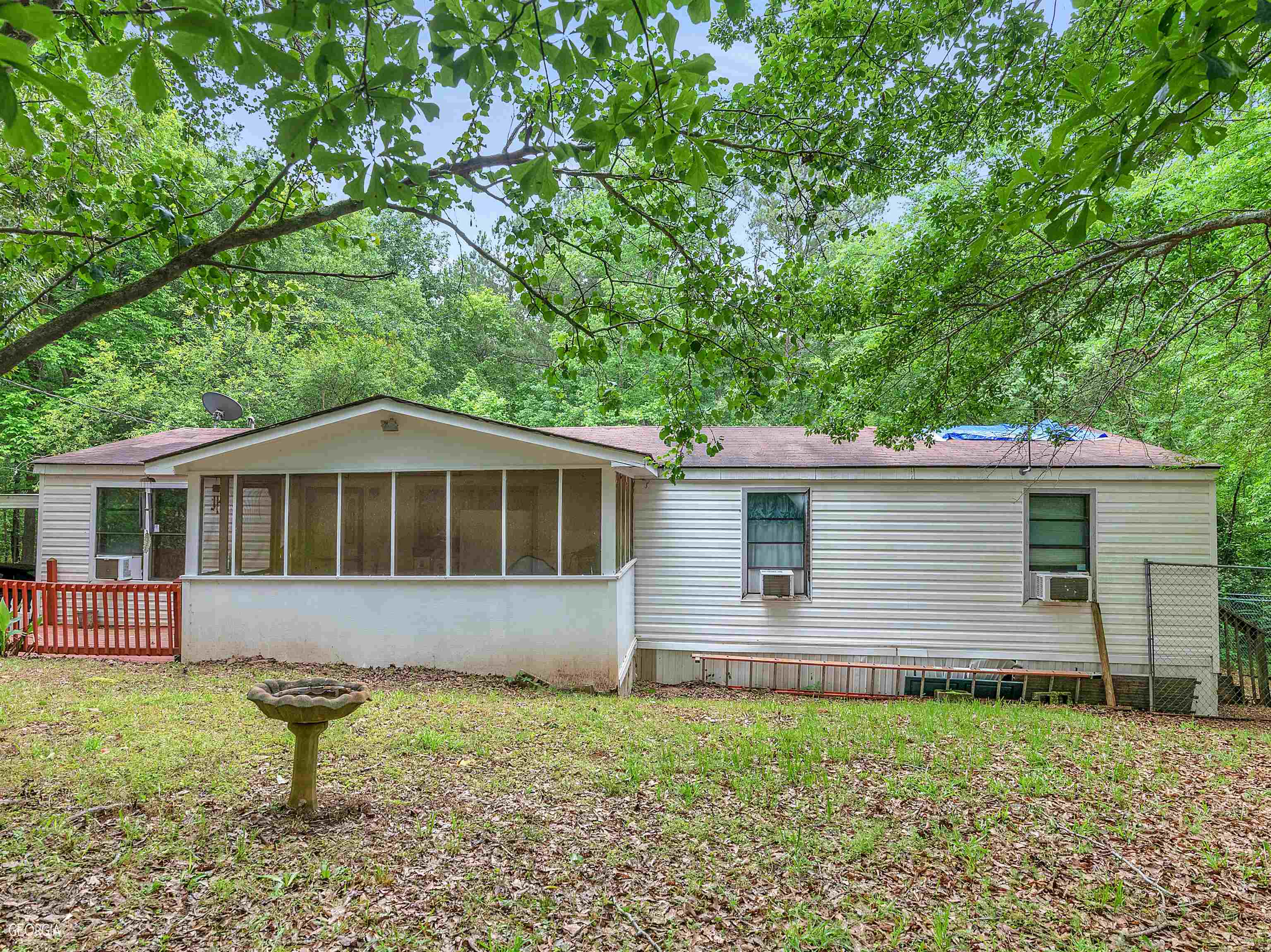 432 Ham Road Jackson, GA 30233 - Photo 1 of 1 a front view of a house with a yard