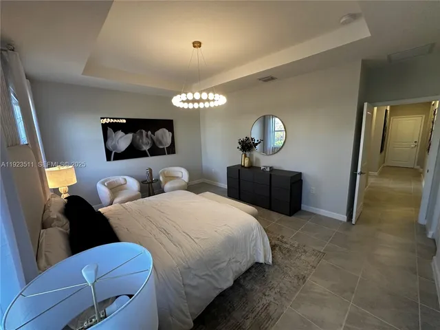 a bathroom with a shower and sink