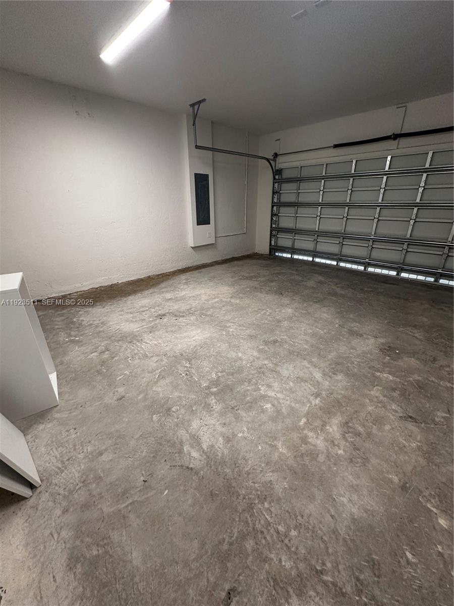 2288 Southeast 30th Street, Unit 1 Homestead, FL 33035 - Photo 23 of 23 a view of a garage