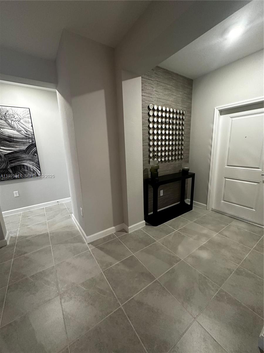 2288 Southeast 30th Street, Unit 1 Homestead, FL 33035 - Photo 9 of 23 a view of an empty room with a sink