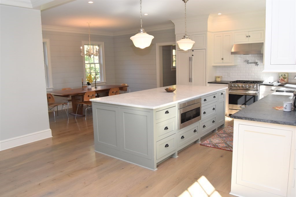 205 North Street Belchertown, MA 01007 - Photo 11 of 42 a kitchen that has a lot of cabinets in it
