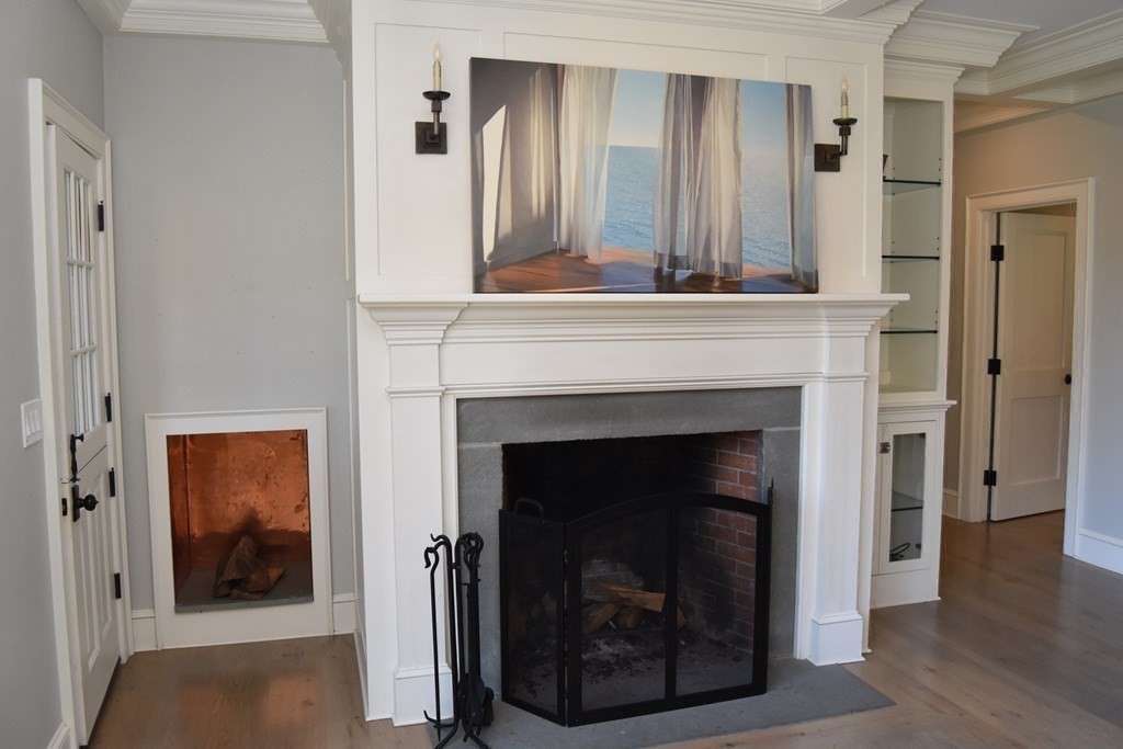 205 North Street Belchertown, MA 01007 - Photo 16 of 42 a living room with a fireplace in it