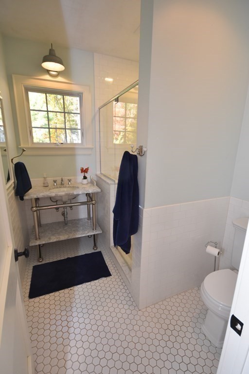 205 North Street Belchertown, MA 01007 - Photo 22 of 42 a bathroom with a sink toilet and window