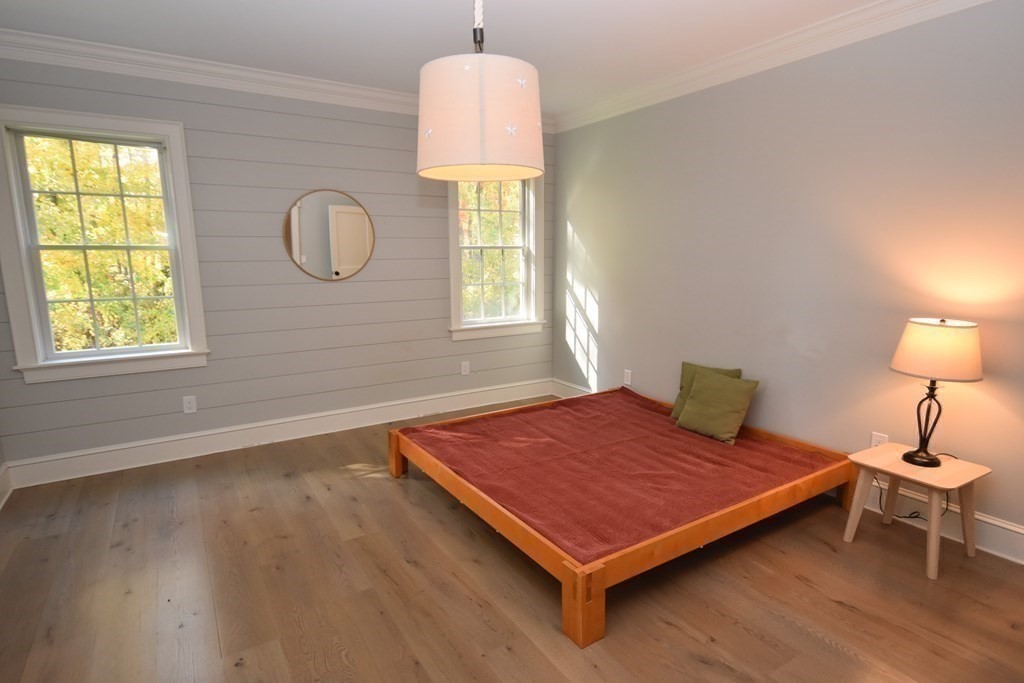 205 North Street Belchertown, MA 01007 - Photo 25 of 42 a bedroom with a bed and window