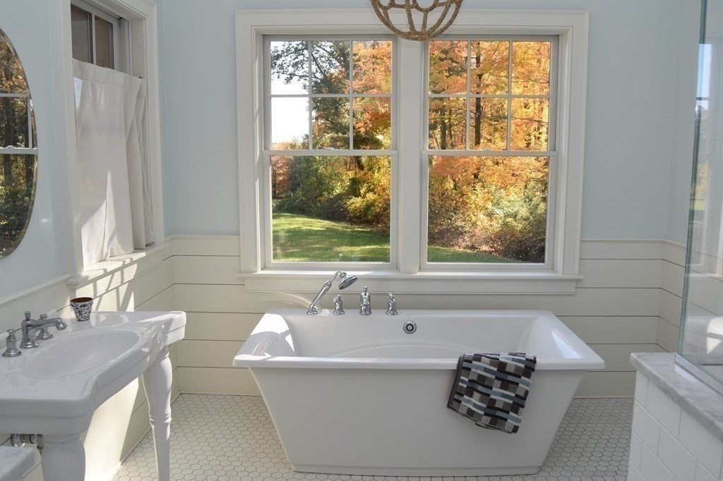 205 North Street Belchertown, MA 01007 - Photo 29 of 42 a bath tub sitting next to a window
