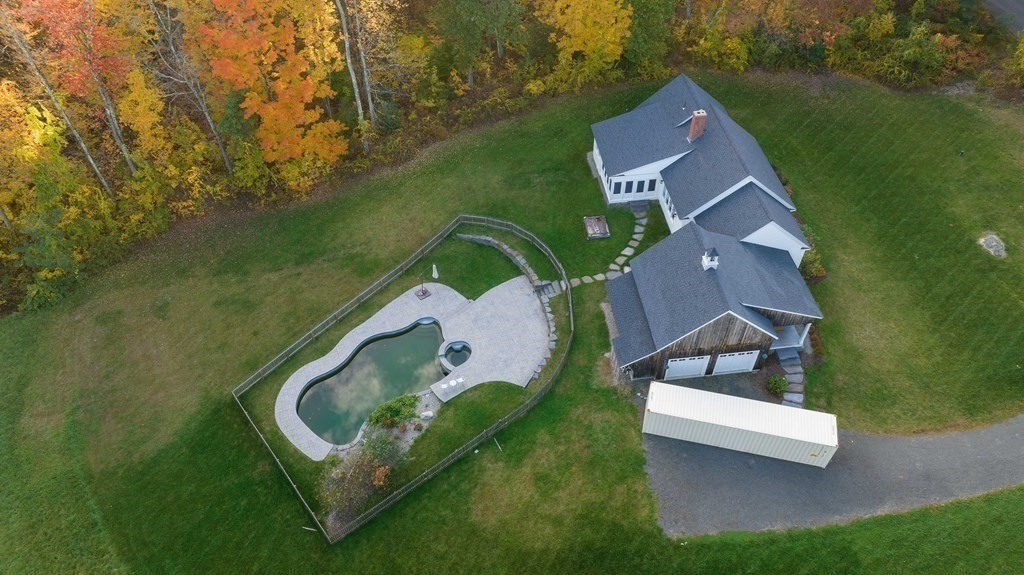 205 North Street Belchertown, MA 01007 - Photo 3 of 42 an aerial view of a house with a garden and swimming pool