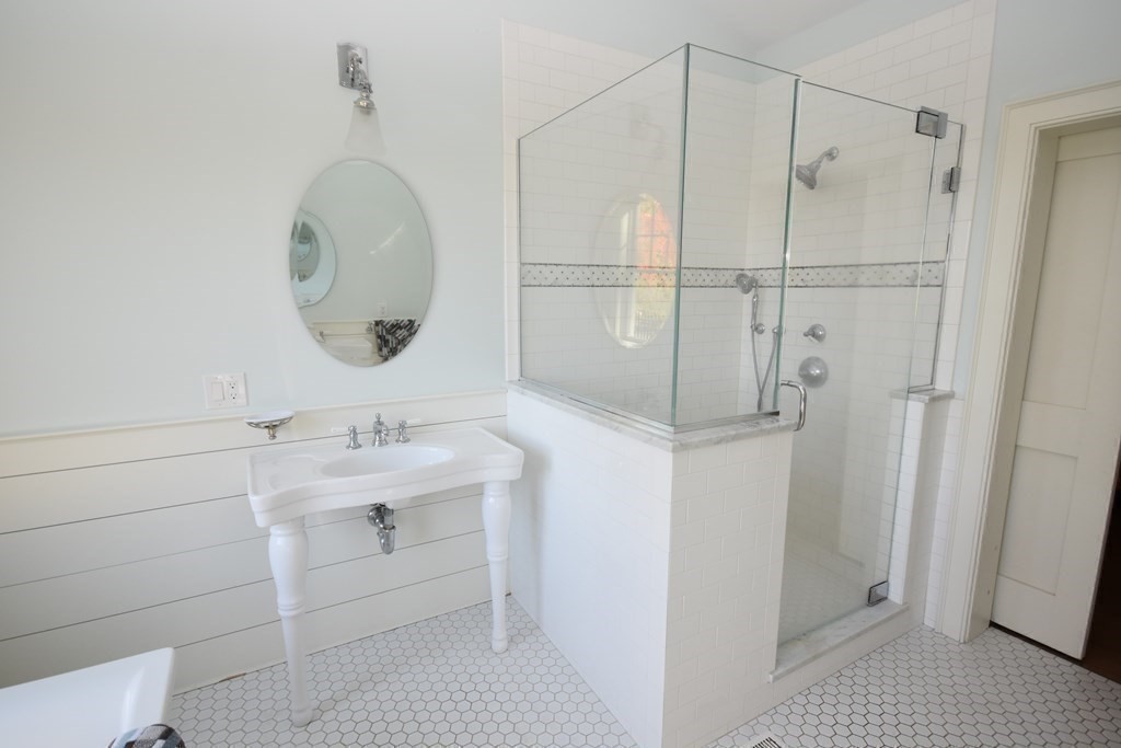 205 North Street Belchertown, MA 01007 - Photo 31 of 42 a bathroom with a sink a toilet and shower