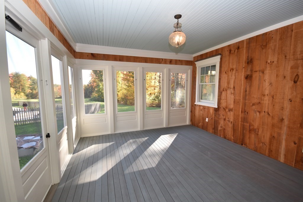 205 North Street Belchertown, MA 01007 - Photo 32 of 42 a view of an empty room with wooden floor and a window