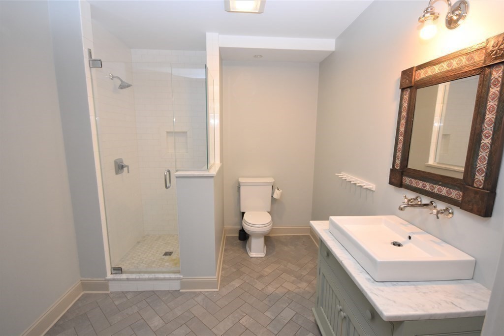 205 North Street Belchertown, MA 01007 - Photo 37 of 42 a bathroom with a sink toilet and shower