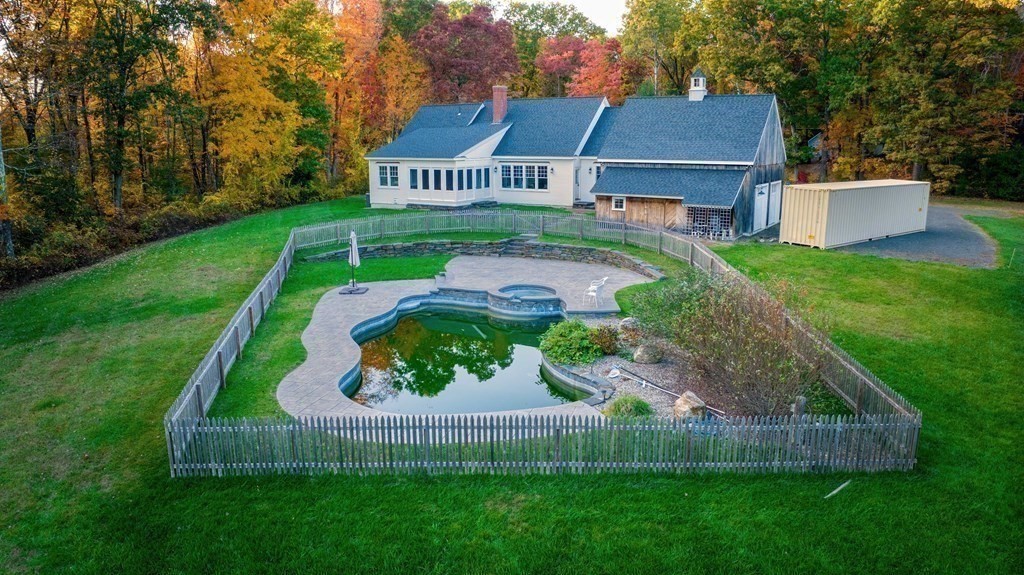 205 North Street Belchertown, MA 01007 - Photo 4 of 42 a view of a house with a garden and deck