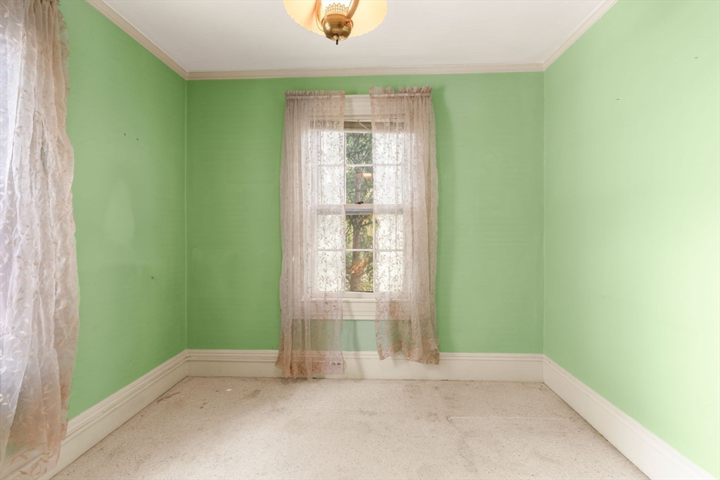 16 Ditson Place Methuen, MA 01844 - Photo 20 of 39 an empty room with a window