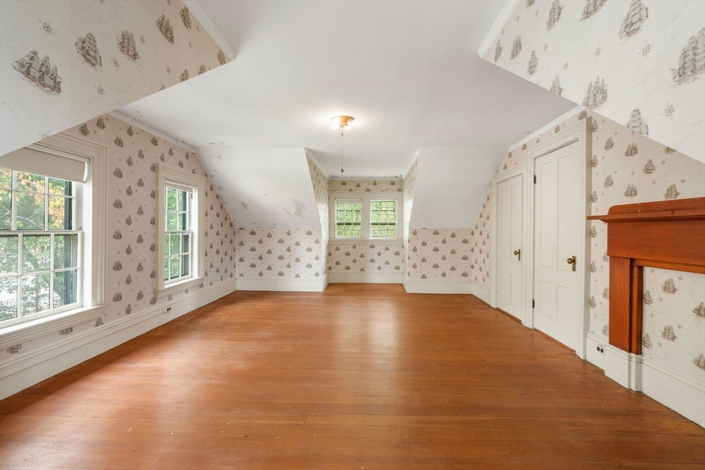 16 Ditson Place Methuen, MA 01844 - Photo 21 of 39 a view of a hallway with windows and chandelier