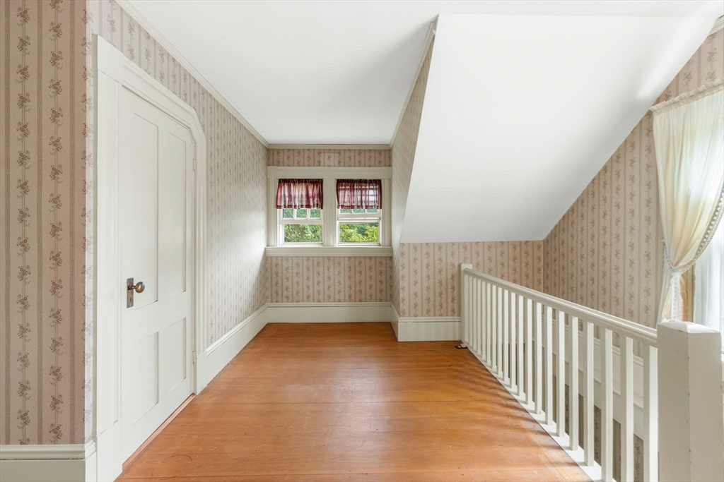 16 Ditson Place Methuen, MA 01844 - Photo 26 of 39 a view of a hallway view with wooden floor and staircase