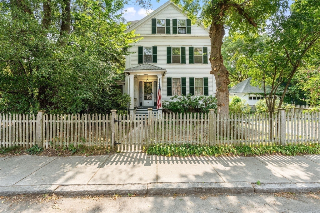 16 Ditson Place Methuen, MA 01844 - Photo 3 of 39 a front view of a house with a garden