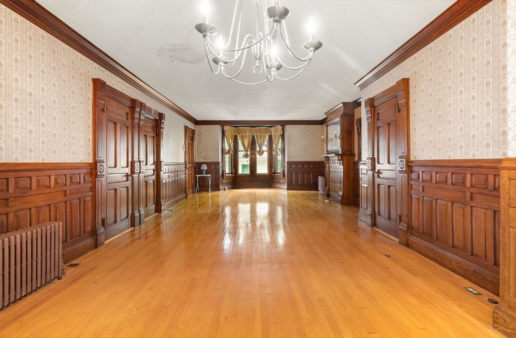 16 Ditson Place Methuen, MA 01844 - Photo 4 of 39 a view of a livingroom with furniture wooden floor chandelier