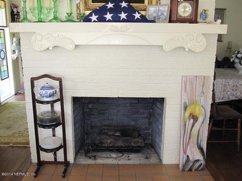 2645 Red Fox Road Orange Park, FL 32073 - Photo 3 of 36 a picture of a fireplace in a utility room