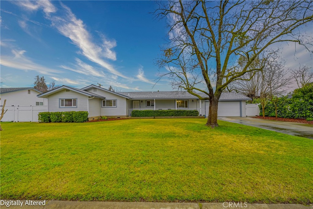 3279 Laura Avenue Merced, CA 95340 - Photo 1 of 1 a front view of a house with a yard