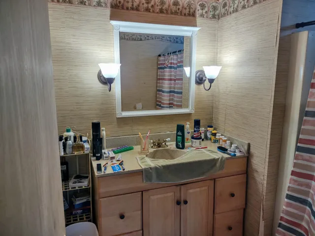 a room with furniture and workspace