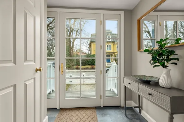 a view of front door and bedroom