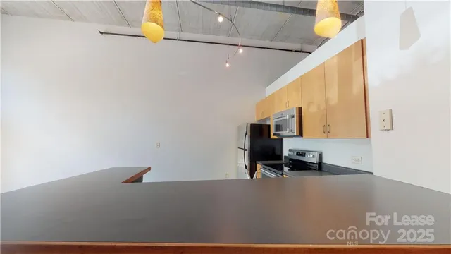 a view of kitchen and living room