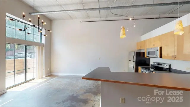 a view of a workspace with furniture