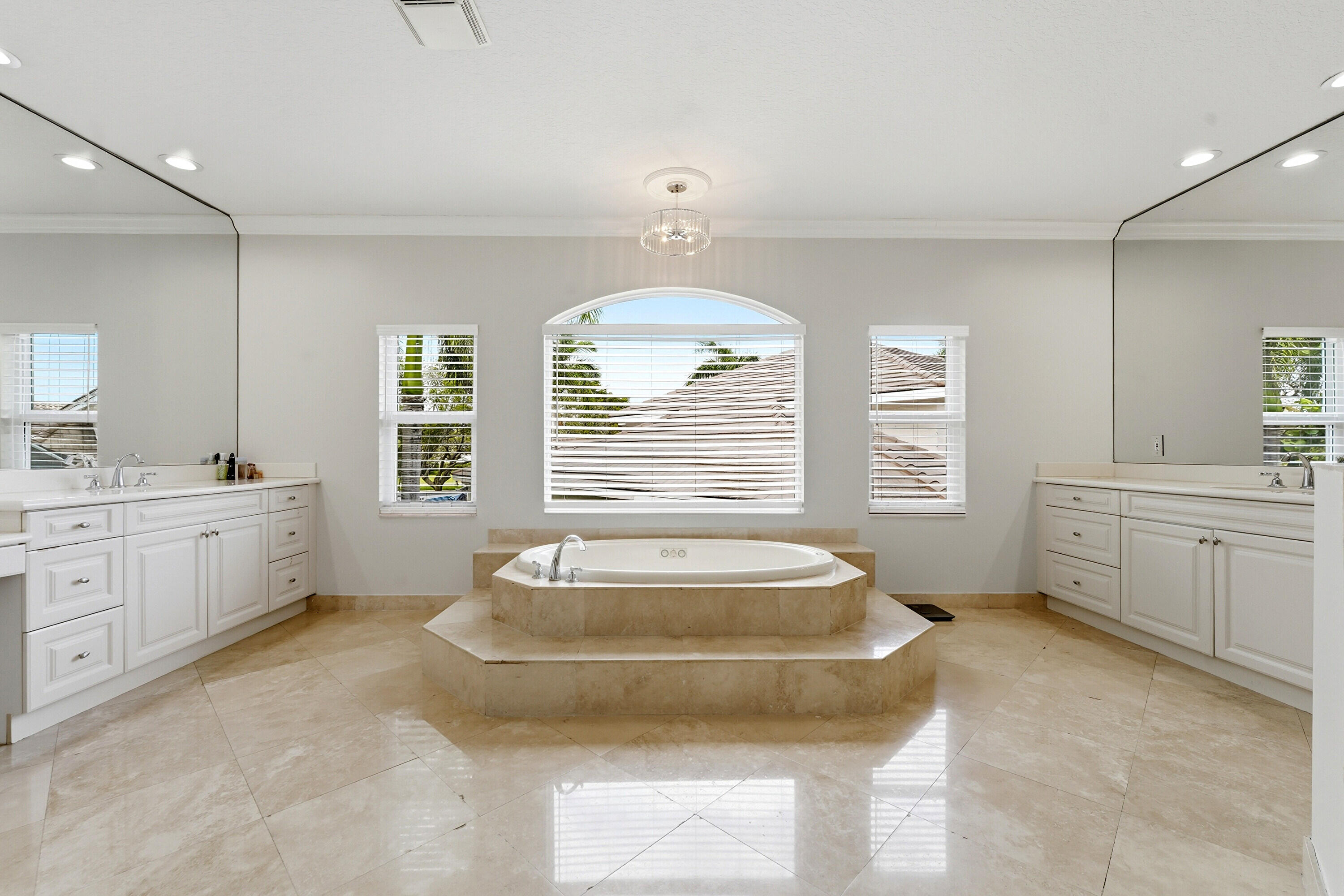 5038 Northwest 24th Circle Boca Raton, FL 33431 - Photo 37 of 54 a spacious bedroom with a bed and window